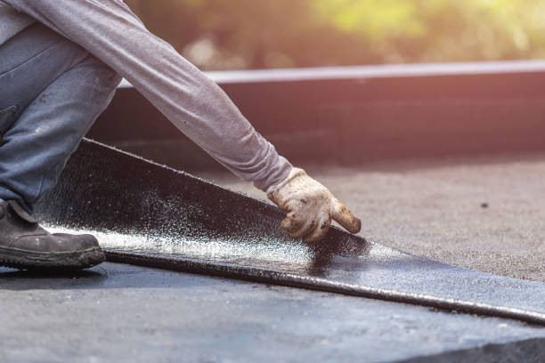 Professional Basement Waterproofing technician working in Woodville, OH